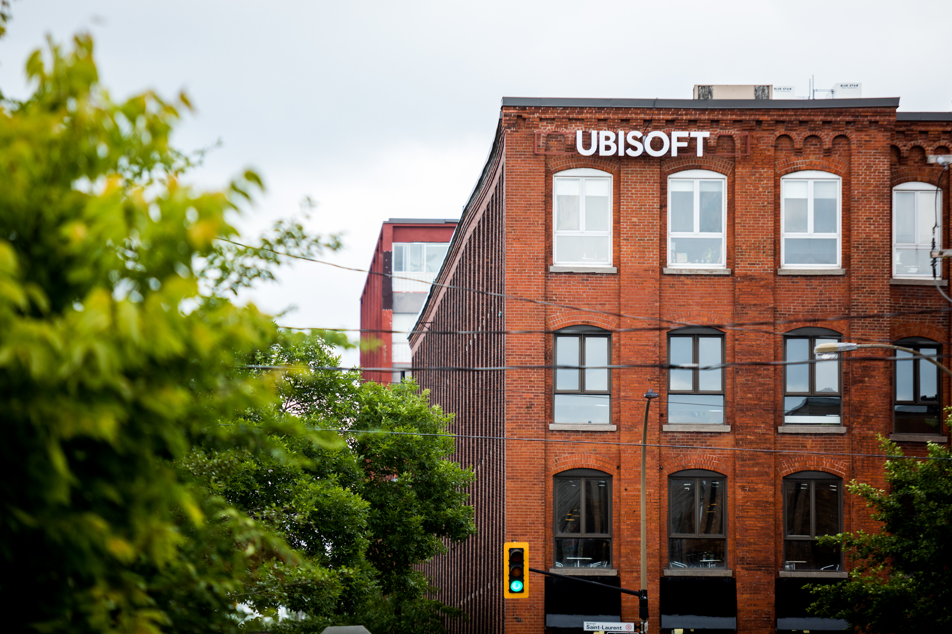 The red-brick Ubisoft building on Boulevard Saint-Laurent, its sign above the top-floor windows