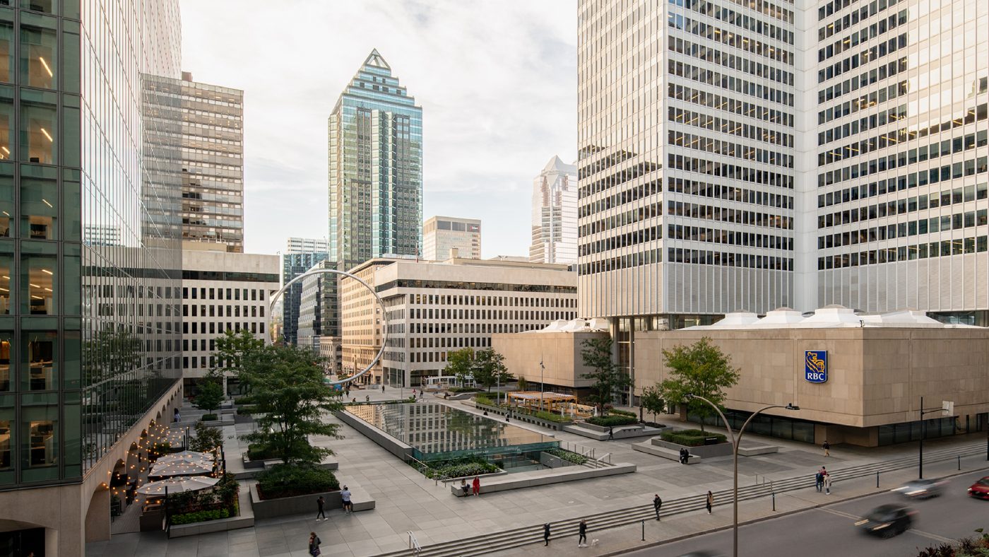 The Esplanade Place Ville Marie with the Ring sculpture, the reflecting pool and the cruciform tower rising behind